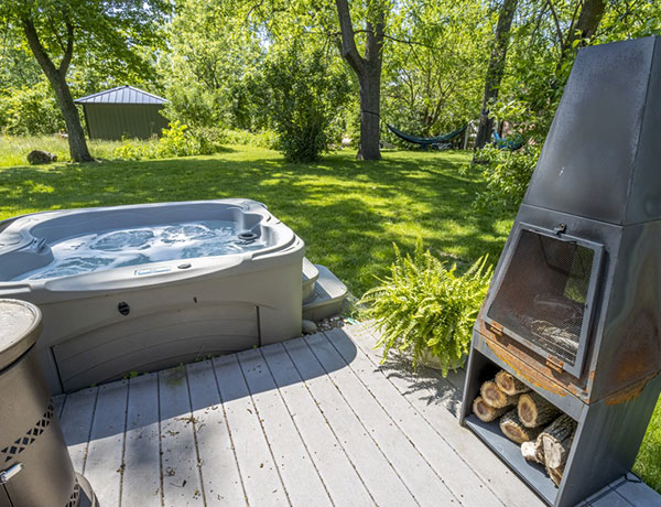 Backyard hot tub at Beachwalk Vacation Rentals